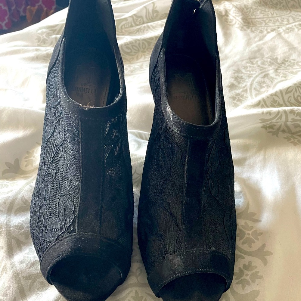 Lace zip up booties. Black size 9